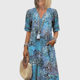 Bella — Robe Midi Florale Élégante