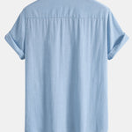 Chemise boutonnée en lin contrastant à imprimé tiki Hawaï