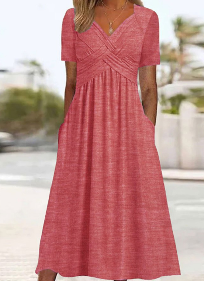 Dominique | Robe portefeuille stylée Rose, photo studio