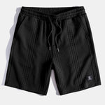 Ensemble — polo jacquard géométrique & short