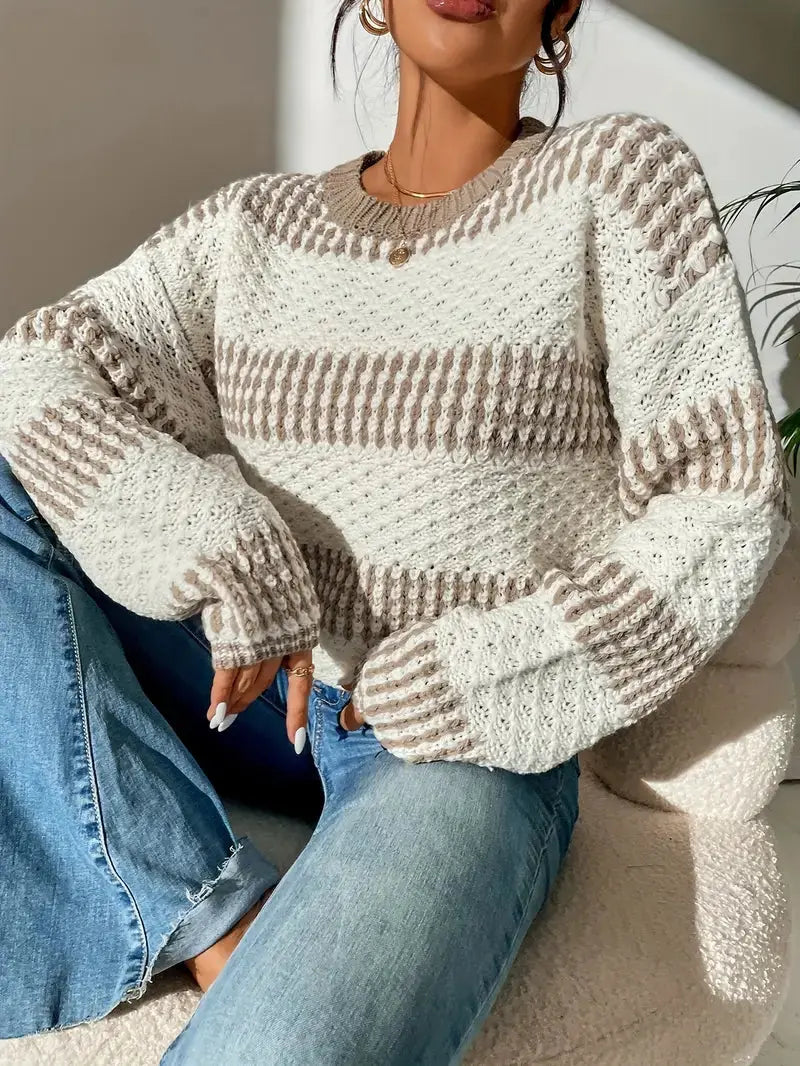 Le pull que l'on prend en premier.