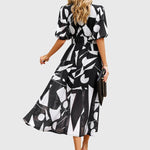 Merlin — Robe Midi Florale Flatteuse