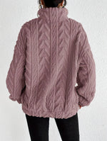 Cassandre | Pull torsadé à col montant zippé