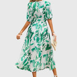Merlin — Robe Midi Florale Flatteuse