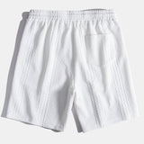 Ensemble — polo jacquard géométrique & short