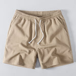 Ensemble — polo crocheté rayé à col V & short texturé froissé à cordon