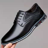 Chaussures habillées John — classiques à lacets