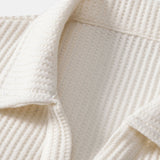 Ensemble — polo gaufré à col V & short gaufré en maille à cordon