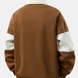 Ensemble — sweat polo patchwork color block & pantalon rayé à ourlet fendu