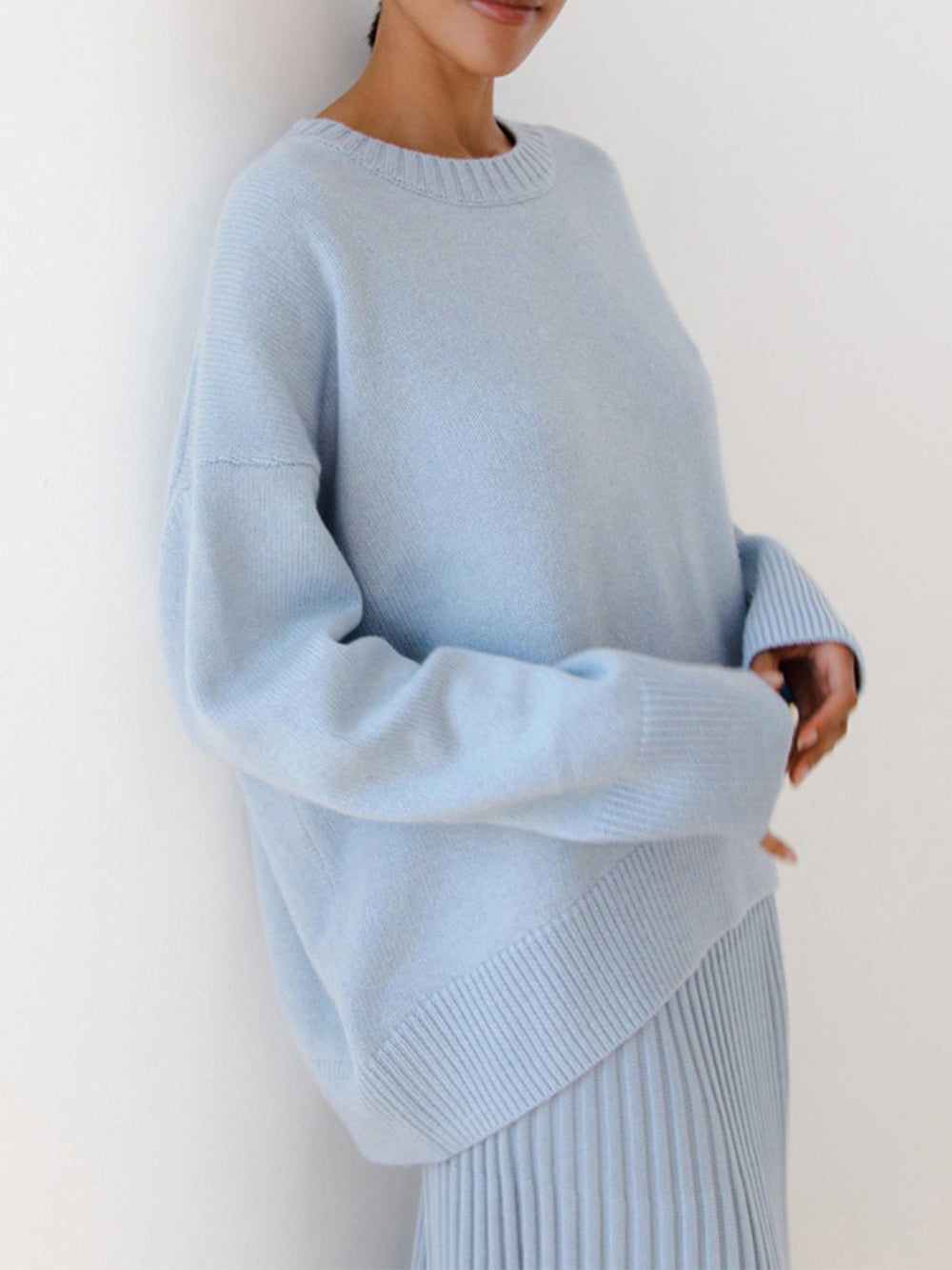 Le pull que l'on prend en premier.