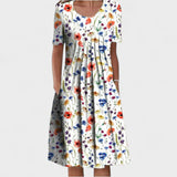 Sylvie | Robe évasée plissée à manches courtes