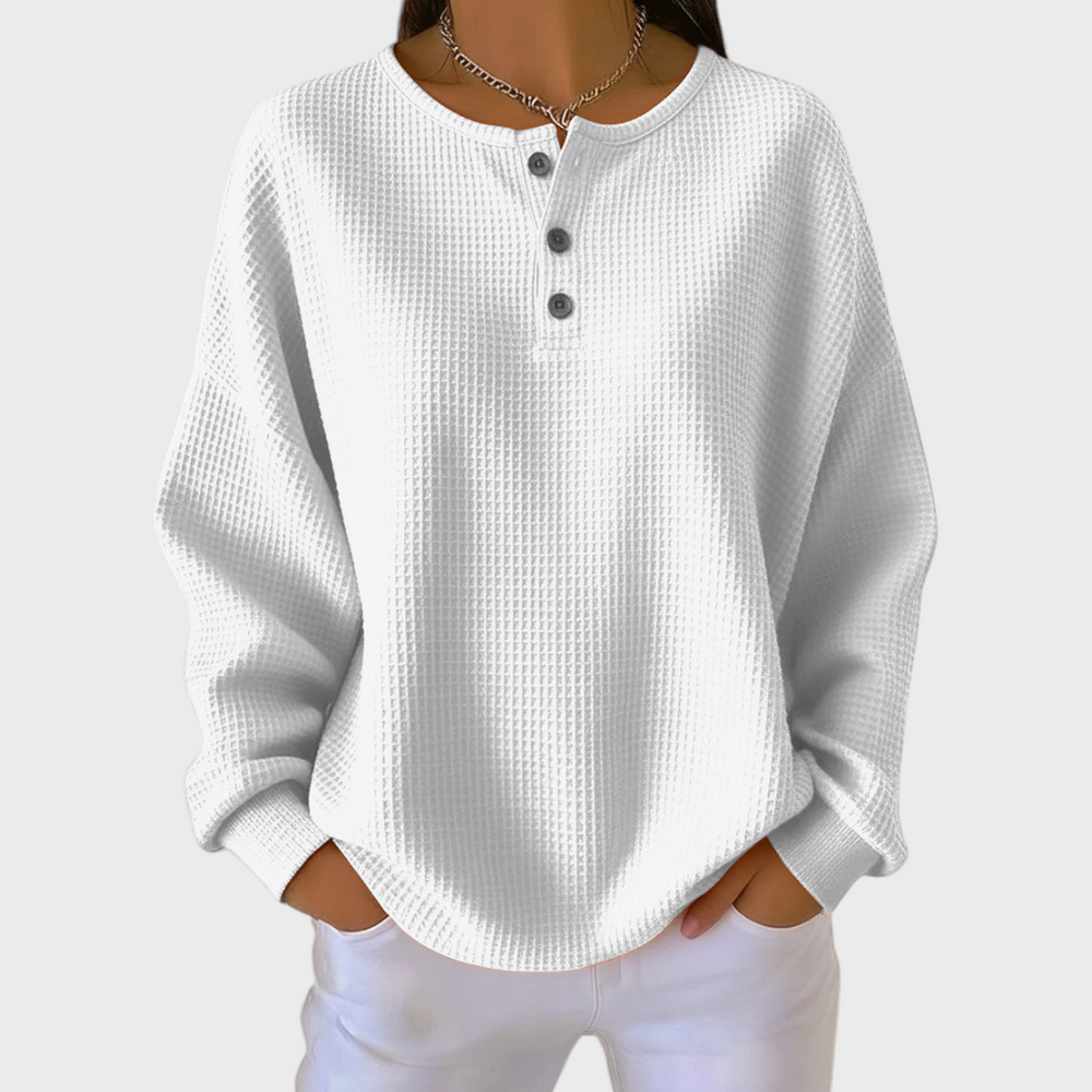 Le pull que l'on prend en premier.