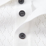 Ensemble Capucine — polo en maille ajourée jacquard géométrique & pantalon en lin à jambe droite
