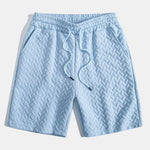 Ensemble — polo jacquard géométrique & short jacquard géométrique