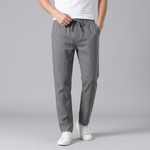 Pantalon à taille élastique, cordon et poches latérales