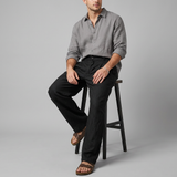 Pantalon à jambe large et taille boutonnée
