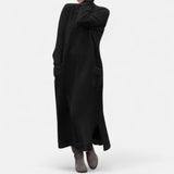Claudine | Robe longue en maille à col montant et poches