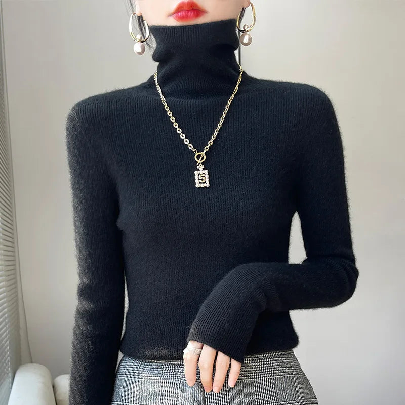 Le pull que l'on prend en premier.