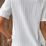 Éva | Blouse à col V crocheté et poignets à volants