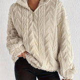 Cassandre | Pull torsadé à col montant zippé