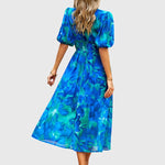 Merlin — Robe Midi Florale Flatteuse