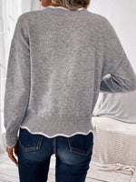 Arlette | Pull en maille à col V et bordure ondulée
