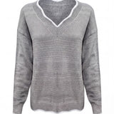 Arlette | Pull en maille à col V et bordure ondulée