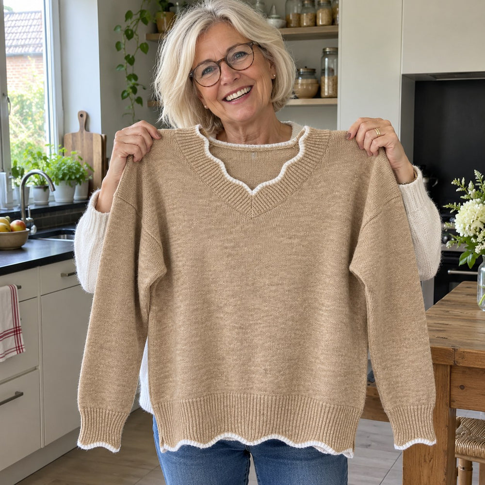 Le pull que l'on prend en premier.