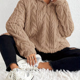 Cassandre | Pull torsadé à col montant zippé