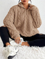 Cassandre | Pull torsadé à col montant zippé