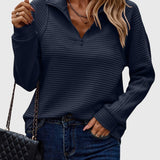 Christine — Pull élégant à demi zip