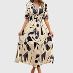 Merlin — Robe Midi Florale Flatteuse