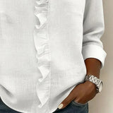 Huguette | Blouse raffinée à col V volanté