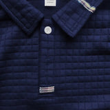 Polo Aaron — classique à poche sur la manche