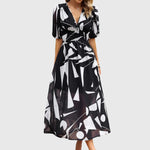 Merlin — Robe Midi Florale Flatteuse