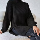 Lorraine | Pull en grosse maille à col roulé et fentes latérales