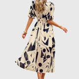 Merlin — Robe Midi Florale Flatteuse