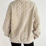 Cassandre | Pull torsadé à col montant zippé