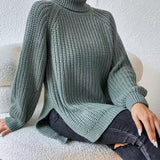 Lorraine | Pull en grosse maille à col roulé et fentes latérales
