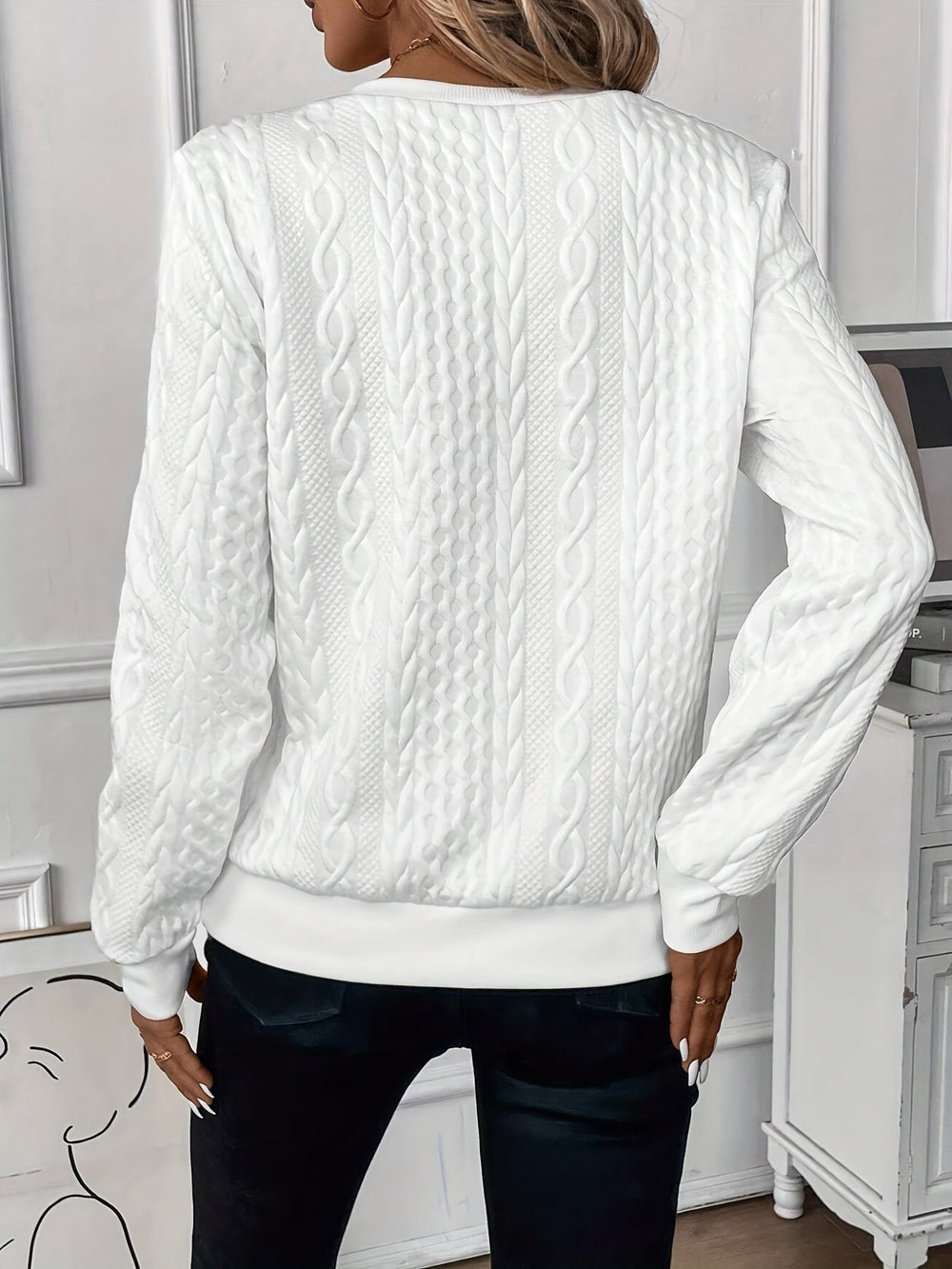 Le pull que l'on prend en premier.