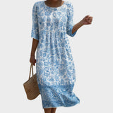 Lauriane | Robe midi fleurie à bordure ornementale