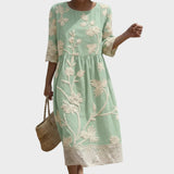 Séverine | Robe midi à motif fleuri et manches mi-longues