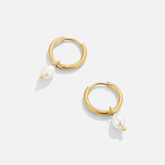 Boucles d’oreilles en or avec pendentif en perle