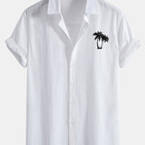 Améline — Chemise boutonnée en lin et coton à imprimé palmiers