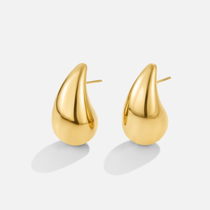 Boucles d’oreilles créoles en or avec une courbe délicate