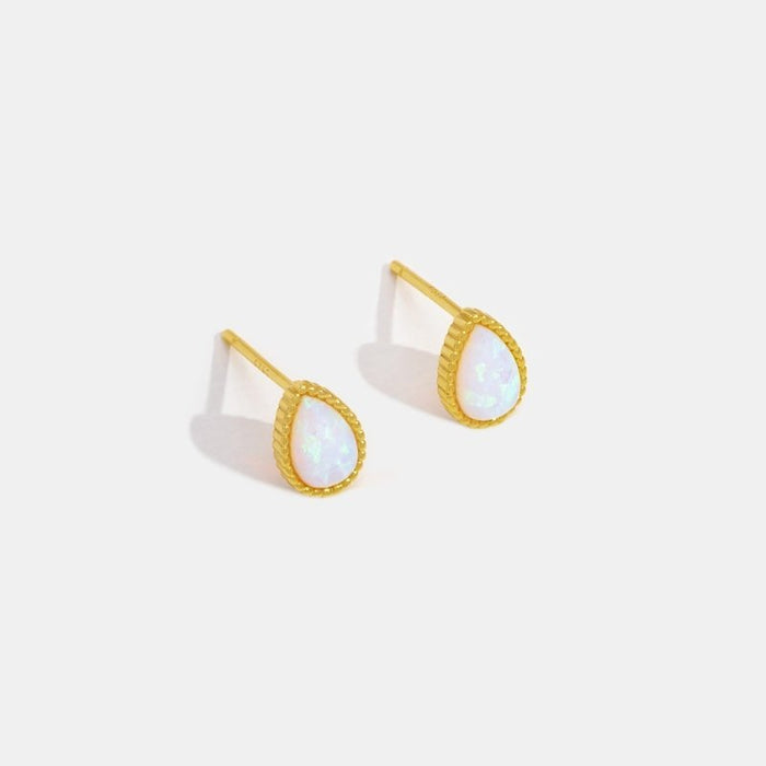 Boucles d’oreilles dorées élégantes.