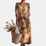 Séverine | Robe longue ample à col en V et grande rosace