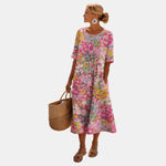 Régine | Robe midi à motif fleuri vintage