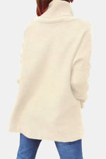 Priscille | Pull ample à col roulé et ourlet fendu