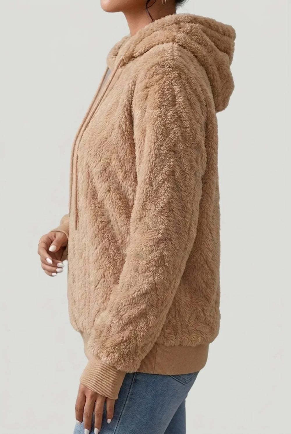 Le pull que l'on prend en premier.